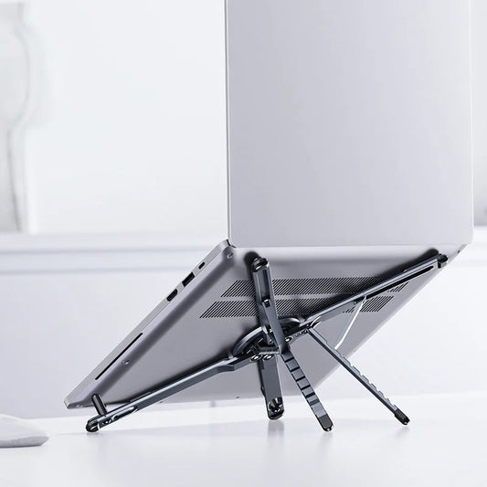 Support de Laptop Pliable et Ajustable: Un Must pour tout Bureau Mobile